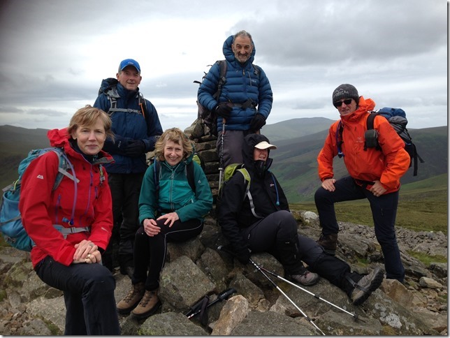 The happy band, minus Russell the photographer, relaxing after first lunch on Carrock Fell