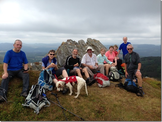 The happy band enjoying first lunch at the summit of Deuchary Hill